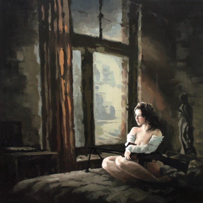 Woman sitting on the bed by the window holding a machine gun